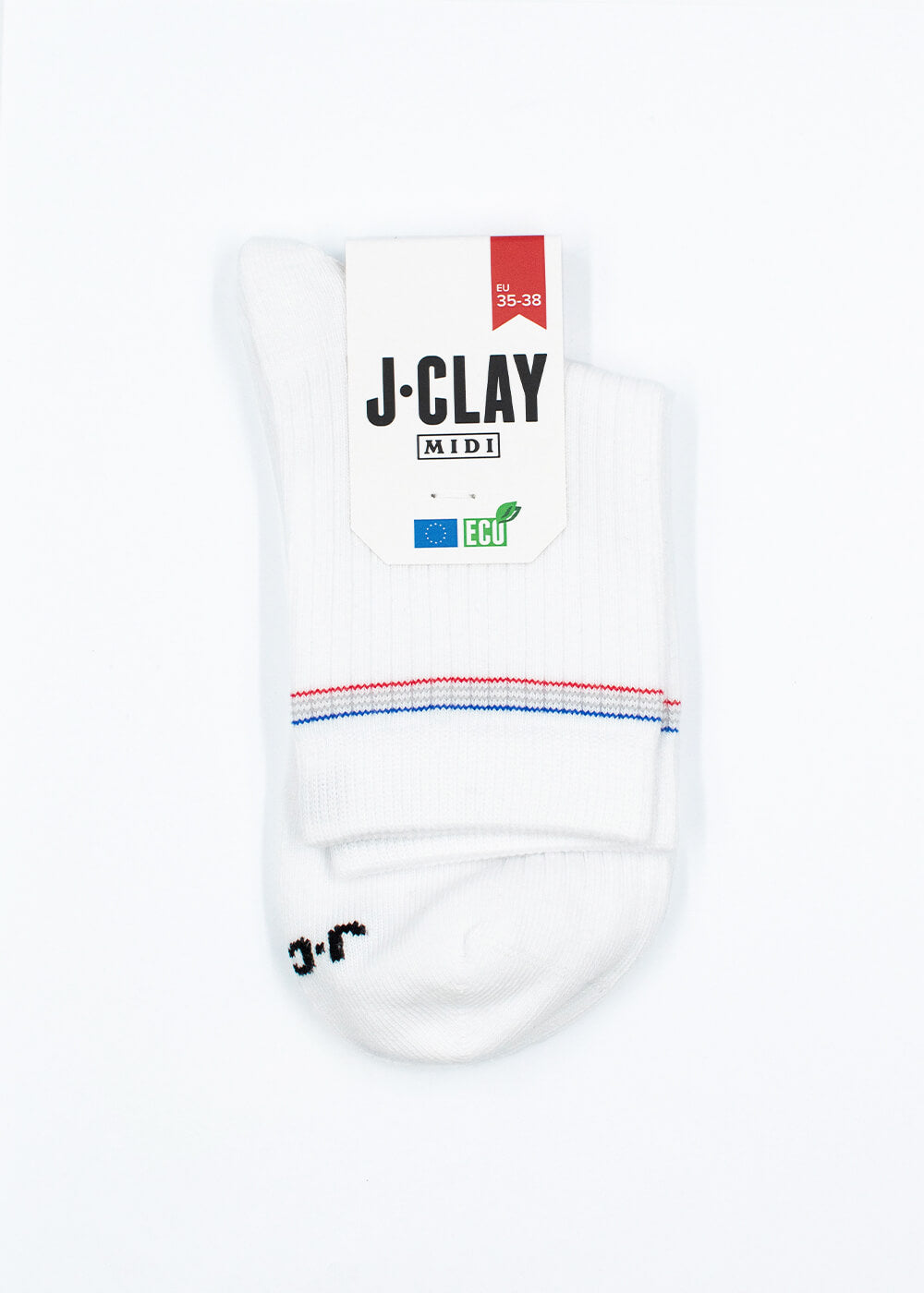 Ein Paar J.Clay weiß gerippte mittelhohe Damensocken aus Bio-Baumwolle mit einem kleinen roten und blauen Streifen ist mit einem Markenetikett gefaltet, das Größe 35-38 und umweltfreundliche Symbole auf weißem Hintergrund zeigt.