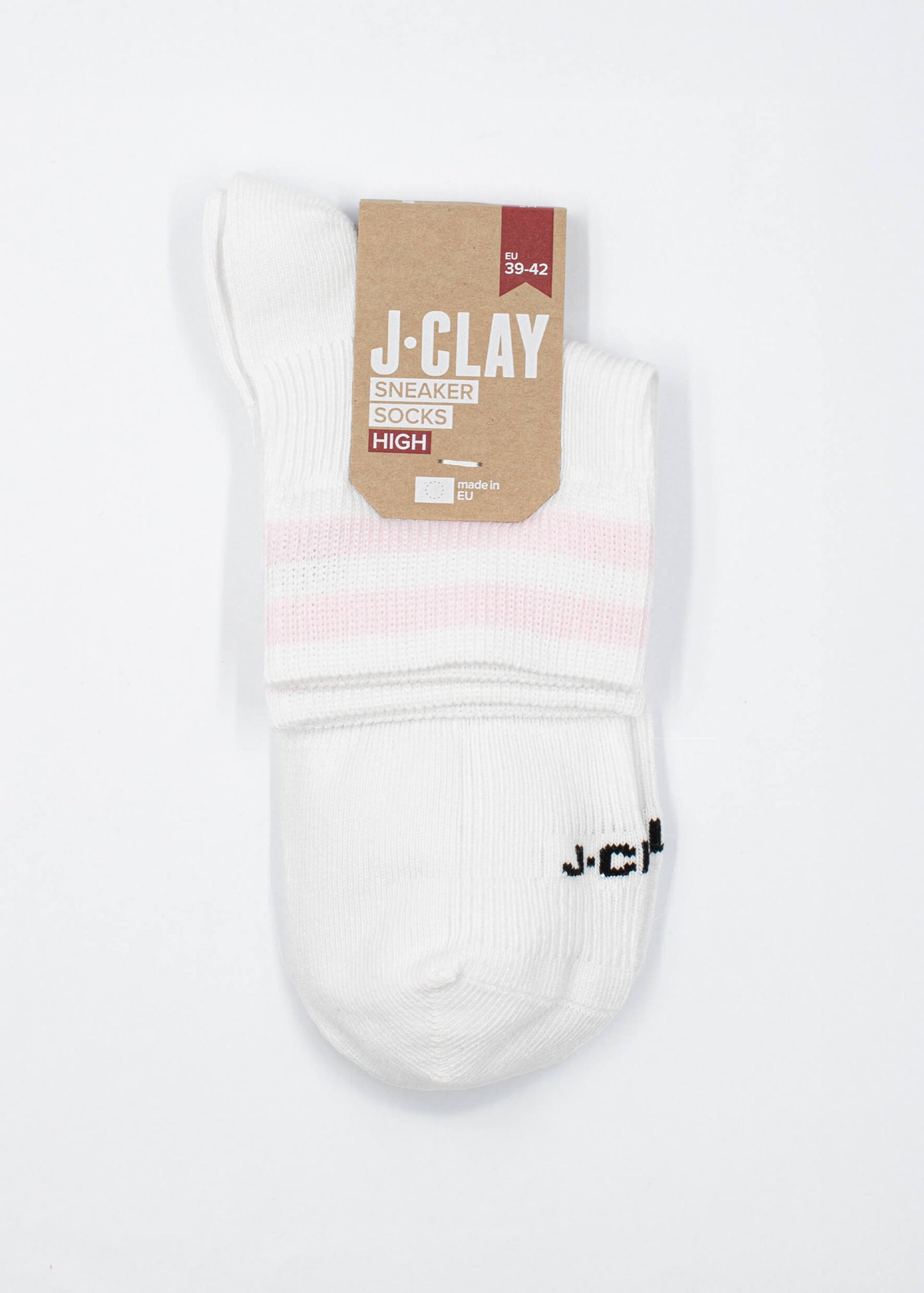 Ein Paar weiße J.Clay Sneaker Socken mit rosa Streifen, gefaltet mit einem braunen J-Clay Sneaker Socks High-Etikett mit Größenangaben, dargestellt auf weißem Hintergrund.
