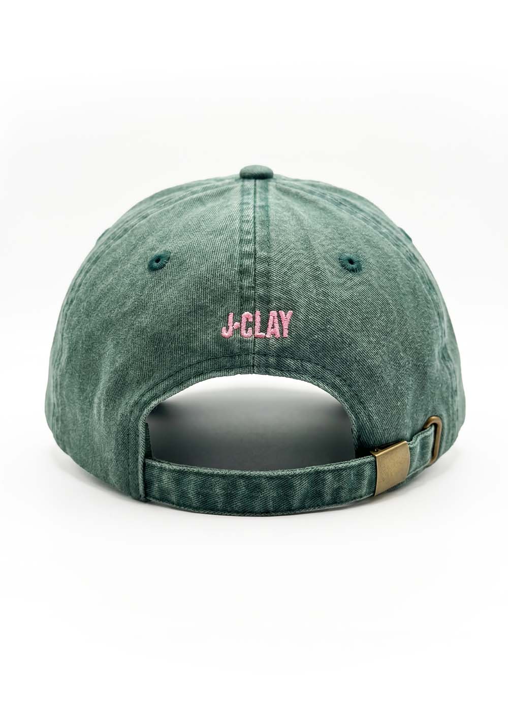 Sorry I'm late Green - Cap von J.Clay, grüner Denim mit rosa Stickerei über der Öffnung.