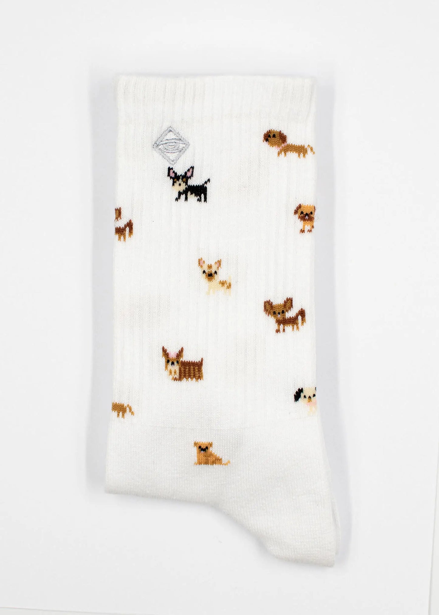 J.Clay Doggy: Weiße Tennissocke mit buntem Hundemuster dezent auf dem Stoff verteilt.