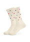 Ein Paar cremefarbene J.Clay Tennissocken mit einem verstreuten Muster aus kleinen roten, rosa, lila und marineblauen Herzen auf weißem Hintergrund.