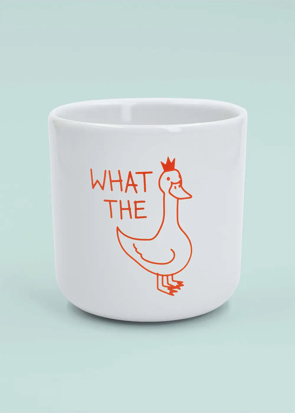 J.Clay What the Duck - Tasse: weiße Tasse mit einer orangefarbenen Ente und "WHAT THE" darüber.