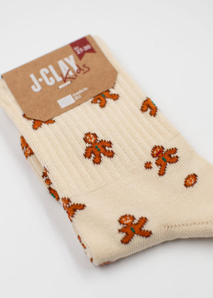 Cremefarbene Socken mit kleinen Lebkuchenmännchen, der J.Clay Lebkuchenmann – festlicher Stil für Kinder.