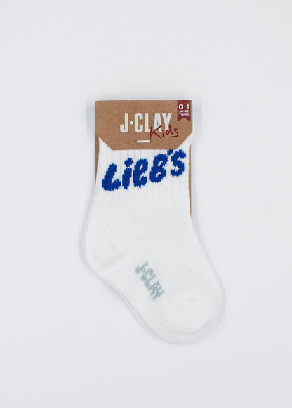 Weiße Babysocken aus Baumwolle mit dem Aufdruck „Lieb‘s“ von J.Clay Kids, modernes Design.
