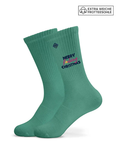 Green Merry fucking X-Mas – Weihnachtssocken mit dem aufgestickten Gruß an der Seite.