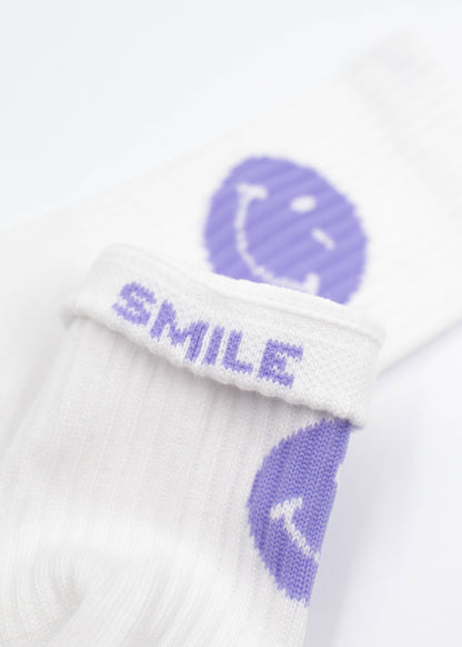 J.Clay Purple Smile - Kids: weiße Kindersocken mit lila Smileys und "SMILE" am Bund.