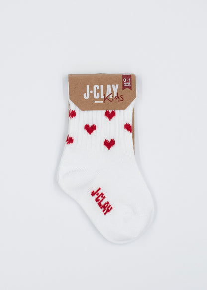 Red Hearts – Mini von J.Clay: Babysocken mit roten Herzen, ideal als Geschenk zur Geburt, verpackt.