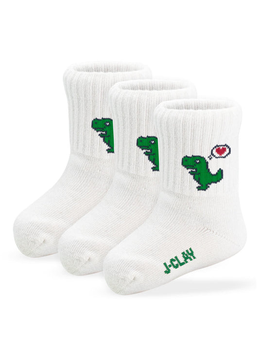 Drei Paar weiße gerippte J.Clay Baby Socken für 0-4 Jahre mit einem grünen Cartoon-Dinosaurier mit einem roten Herz über dem Kopf und "JCLAY" in Grün auf der Spitze - eine lustige, bequeme Wahl für Kinder Socken.