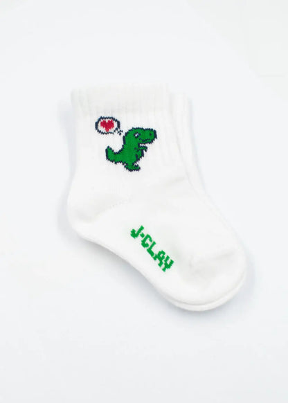 J.Clay Dino Love - Mini: Weiße Babysocken mit grünem Dino und roter Herz-Sprechblase.