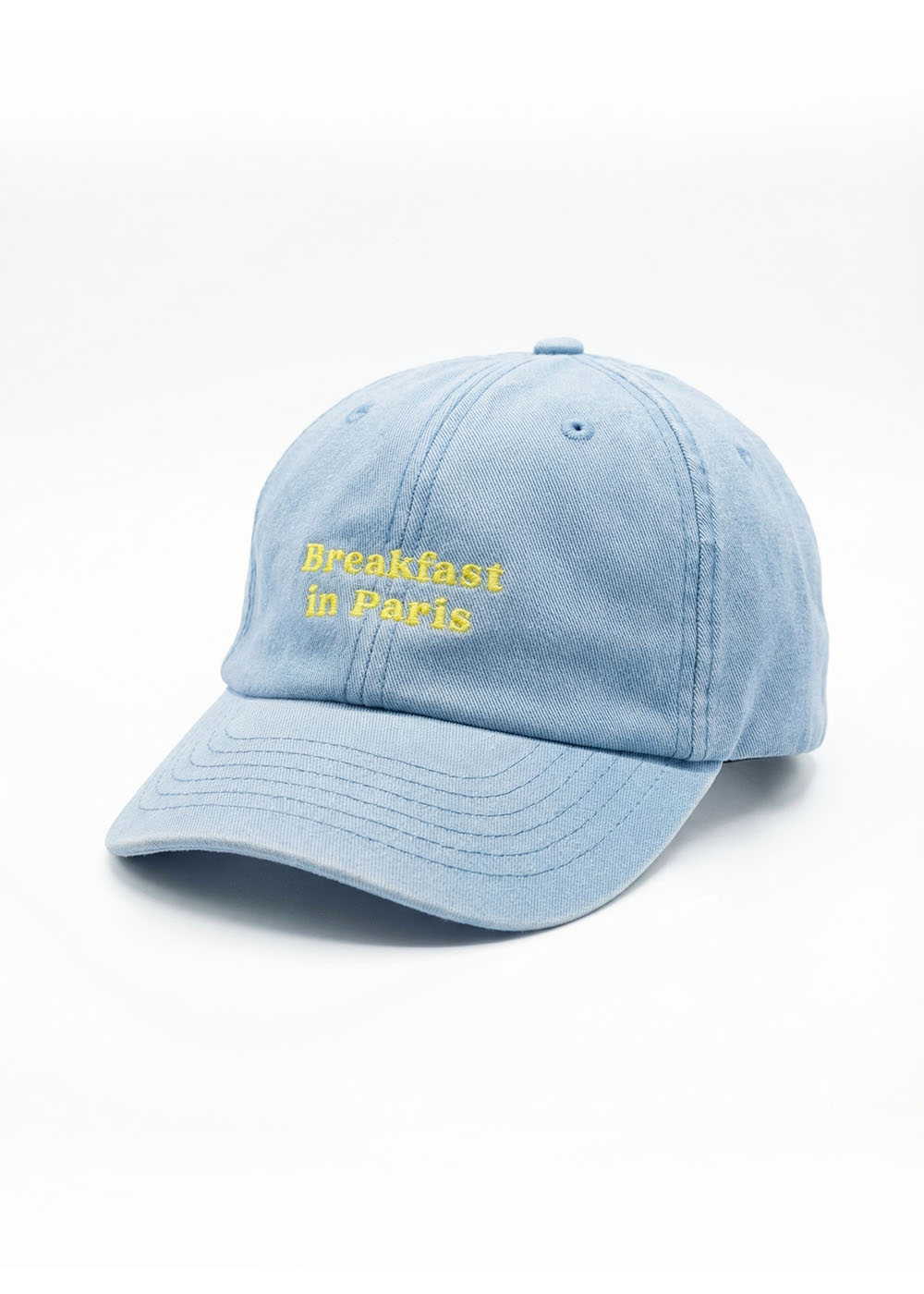 J.Clay Breakfast in Paris Kids Cap - hellblau mit gelbem Text, perfekt für Familienlooks.